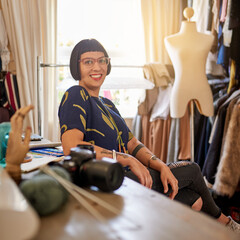 Portrait, woman and fashion designer in atelier with smile as stylist for company or customer as...