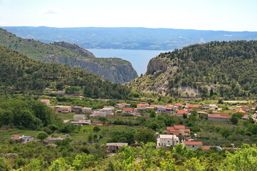 Mediterranean village and river canyon in front of Adriatic sea