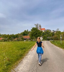 girl walking on the road