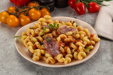 Italian pasta cellentani with anchovy