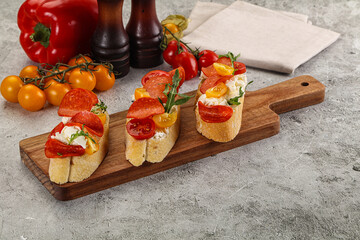 Bruschetta tapas with chorizo and tomato