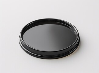 "A Black Oval Plate with a Shadowy Reflection"
