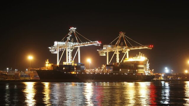 4K Timelapse of Freighter cargo container ship being unloaded. Fremantle Perth, Western Australia 