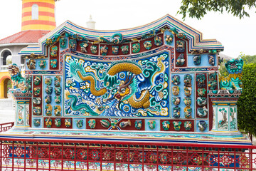 Colorful wall made of multi-colored porcelain with Chinese national symbols at Bang Pa-In Palace in Ayutthaya, Thailand