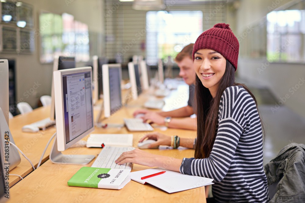 Poster Happy woman, portrait and library with computer at university for education, learning or project. Online, scholarship and student at desk for browsing internet, knowledge or working on assignment