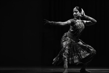 Arafed woman in a black and white photo performing a dance