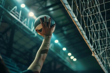 Female athletes hands throwing volleyball ball through net side view 