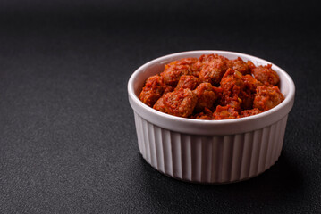Delicious soy meat with tomato sauce, salt and spices