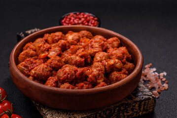 Delicious soy meat with tomato sauce, salt and spices