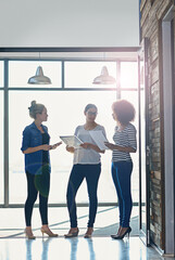 Business people, women and teamwork with meeting for planning in office for brainstorming and idea briefing. B2b, employees and discussion with notes for financial review, project report and feedback