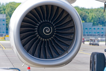 Close-up of engine with blades of passenger airplane parked at Zürich Kloten Airport. Photo taken...