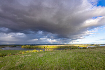 Obraz premium panoramic view of a meandering river, possibly a meander, which is a term used to describe a bend in a river.