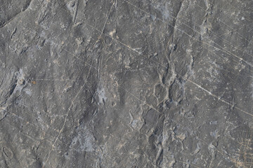 Stone texture worn by the wind and the sea of ​​the coast located on a wild beach.