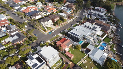 Obraz premium Aerial drone view of waterfront property and houses