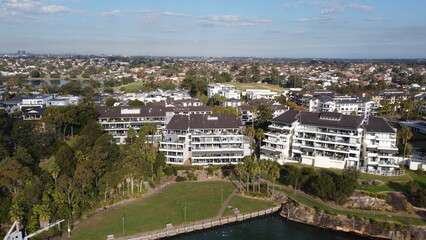 Fototapeta premium Aerial drone view of waterfront property and houses