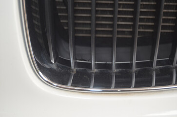 Car headlight close-up. Luxury vehicle detail of headlight.