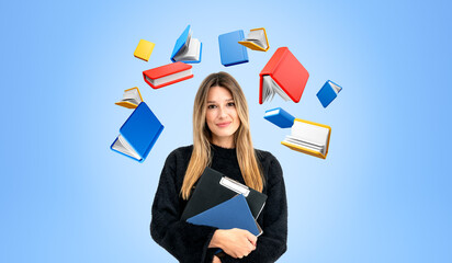 A woman holding books with floating books around her on a light