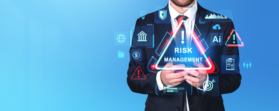 Businessman using smartphone, risk management hologram with glowing icons