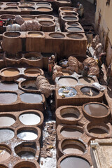 Fez, the partial view on Chouara Tannery, old medina.  The leather goods produced in the tanneries are exported around the world
