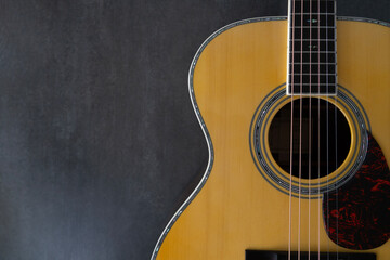 close up guitar on black table background, music concept