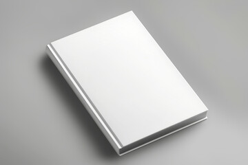 A white book peacefully sits atop a wooden table, exuding an ethereal presence. Mockup for design.