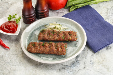 Kebab with beef served onion