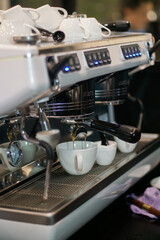 Coffee machine pouring espresso