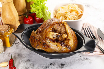 Baked pork knee with spices