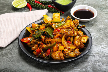 Vietnamese cuisine - fried frog with vegetables