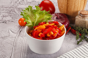 Diced raw bell red and yellow pepper