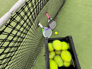 padel tennis racket sport court and balls.