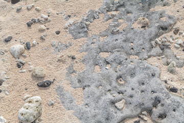 Sand with Beachrock. Beachrock is a friable to well-cemented sedimentary rock that consists of a variable mixture of gravel-, sand-, and silt-sized sediment. fragments of coral and shells . Geology


