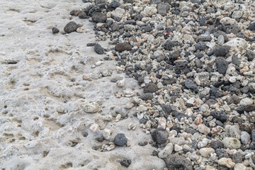 Beachrock is a friable to well-cemented sedimentary rock that consists of a variable mixture of...