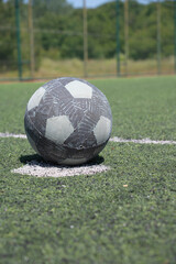 Soccer ball on the green grass