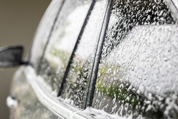 car cleaning and washing with foam soap