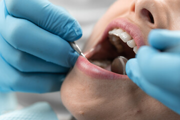 The dentist conducts research and advises the patient on the best methods of treatment and dental...