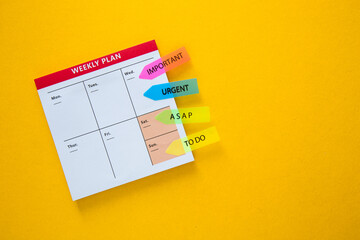 Colorful weekly planner with urgency stickers