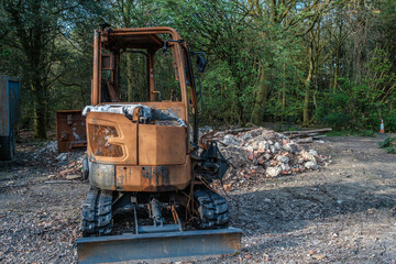 Burnt out construction digger by thieves.