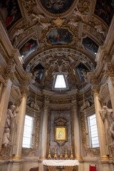 Fototapeta premium Vibrant ceiling decor in a spacious church interior in in the province of Pesaro and Urbino