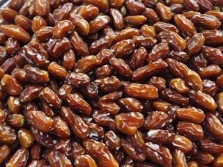 dates close up. date palm background. Date palm on a traditional craftsman market.Horizontal image.