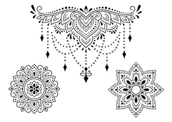 Set of Eastern ethnic religious symbols. Mandala and Lotus flower. Decorative pattern for henna, mehndi, tattoos, room decoration. Outline doodle vector illustration.