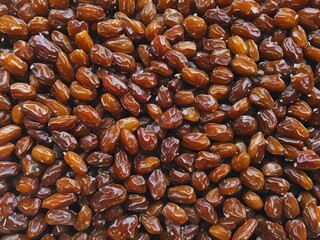 dates close up. date palm background. Date palm on a traditional craftsman market.Horizontal image.