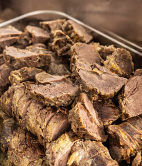 Juicy pieces of slow-cooked beef brisket