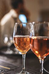 Close-up of two glasses of rose sparkling wine