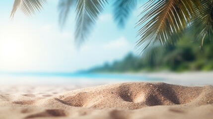 The sand on the beach has coconut leaves with blurred palms. Tropical beach, summer vacation and travel concept. copy space