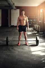 Man, portrait and barbell weightlifting in gym for muscle growth or bodybuilder athlete, sports or...