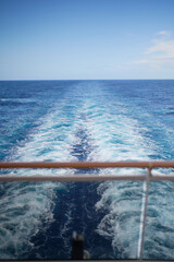 the ocean is wide and blue as it reflects itself on a sunny day
