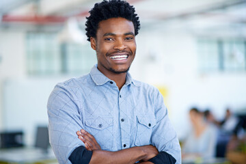 Confidence, creative and portrait of black man in office with smile, trust and project manager at agency. About us, design and happy businessman with opportunity, arms crossed and pride at startup