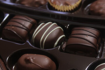 Close-up of chocolates in a variety of flavors