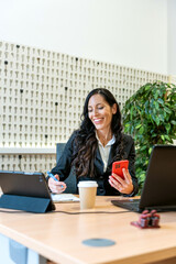 Businesswoman utilizing tablet for remote work